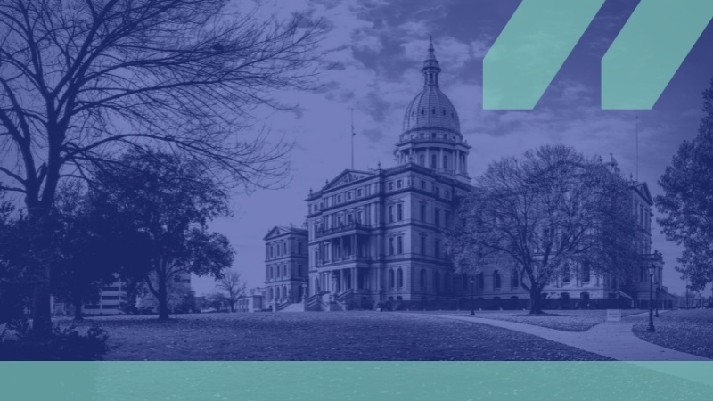 Lansing Capital Building with royal blue overlay and teal MCAN logo in the top right corner