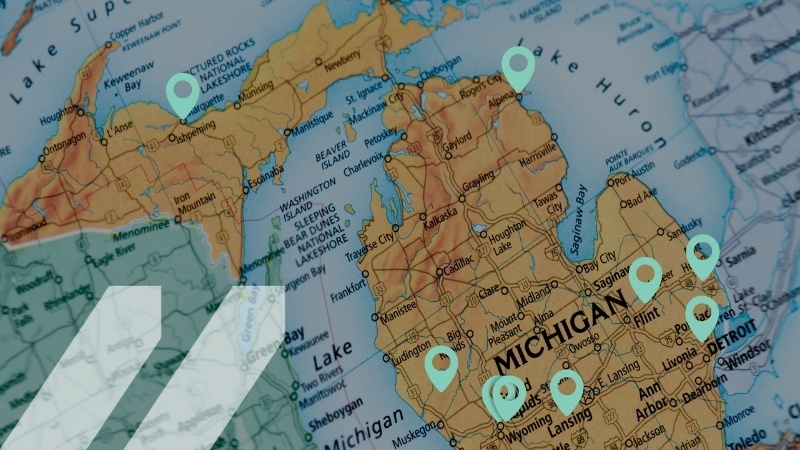 Image of a map of the state of Michigan, with flags marking the locations of the 10 MCAN birthday grantees 