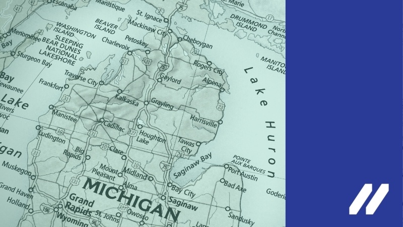 Map of Michigan with blue banner and MCAN logo over top