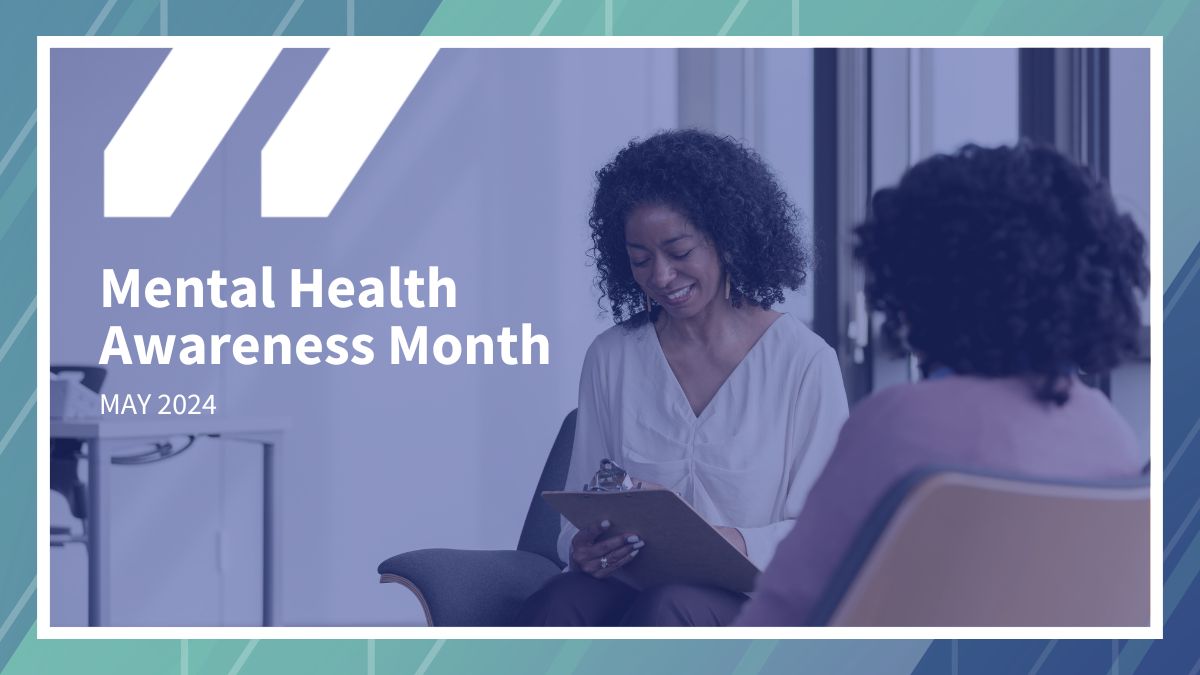 Mental Health Awareness Month May 2024. Two women sit and talk, one holding a clipboard.