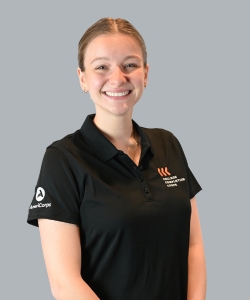 Stephanie Maendel wearing a black polo shirt